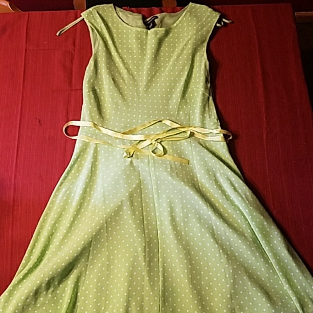 Green dress with white polka dots