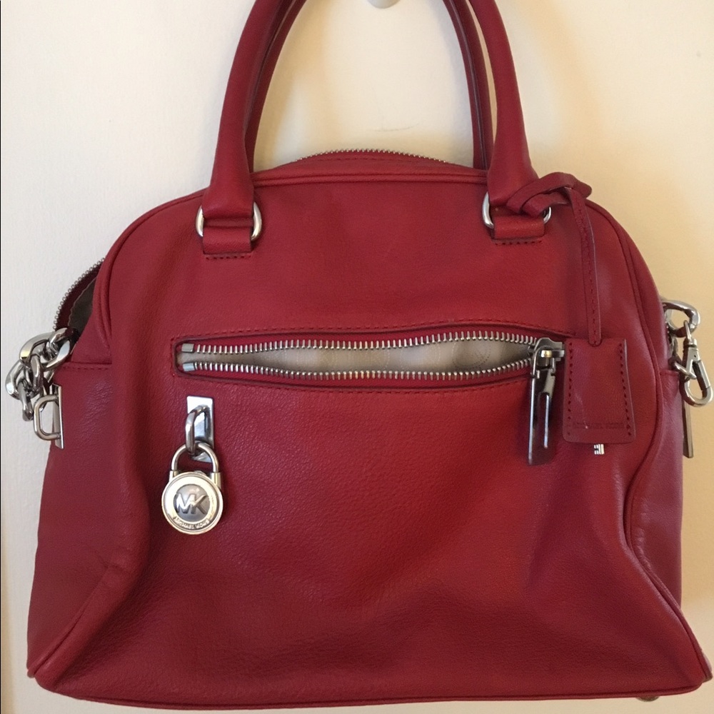 Red Michael Kors handbag