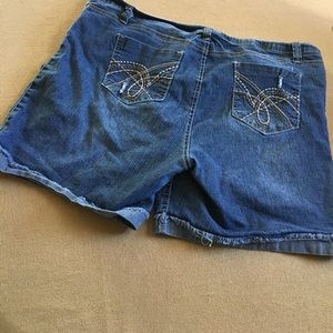 Distressed denim shorts