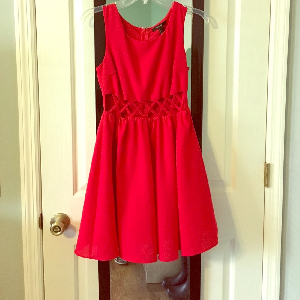 Red skater dress with cut outs