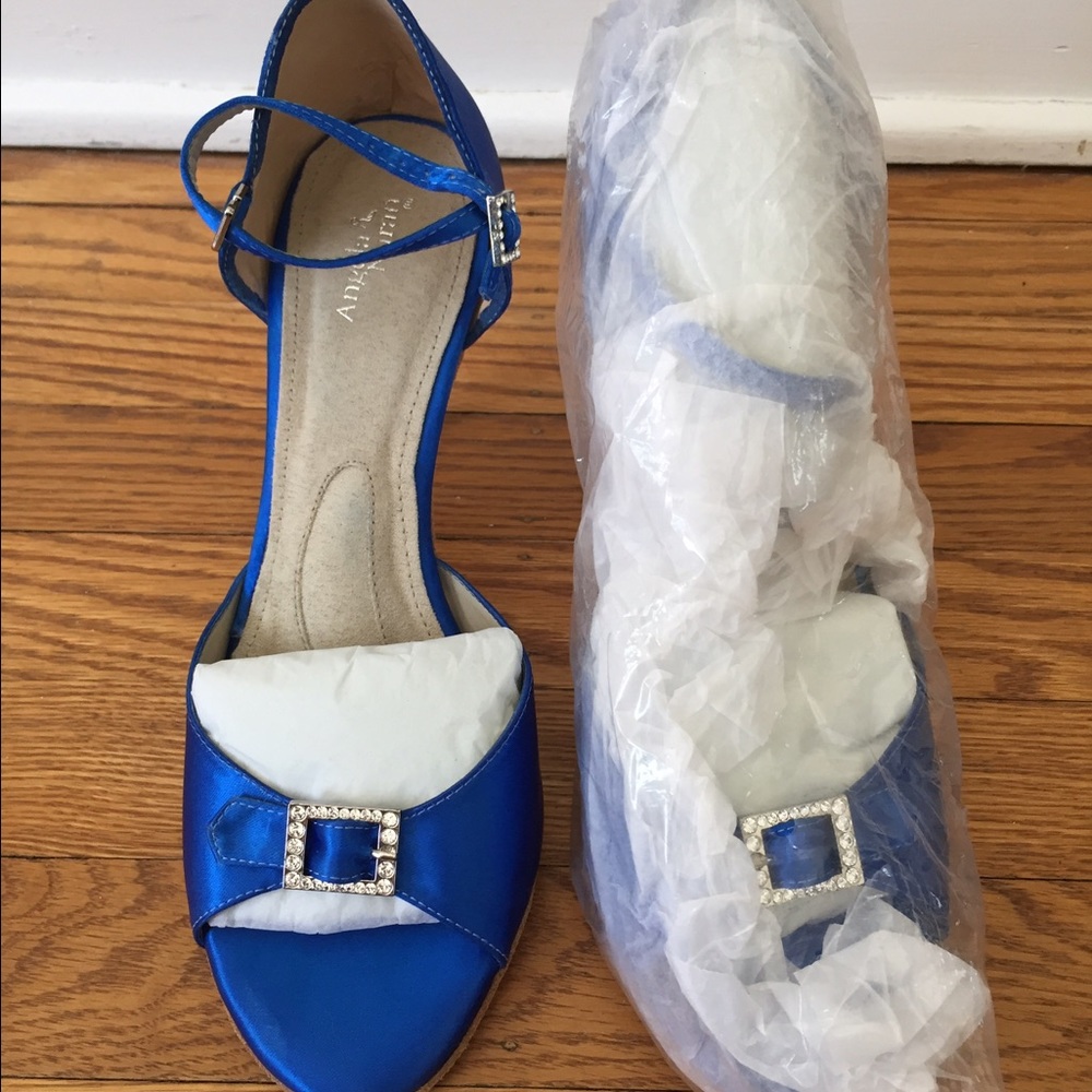 Angela Nuran heels with hand Glitz