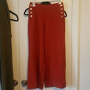 Rust orange button culotte ankle pants. Size XS