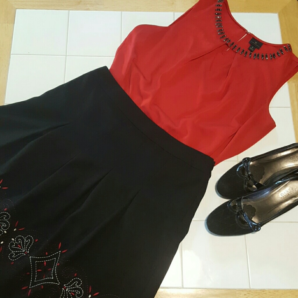Red blouse with black jewel collar