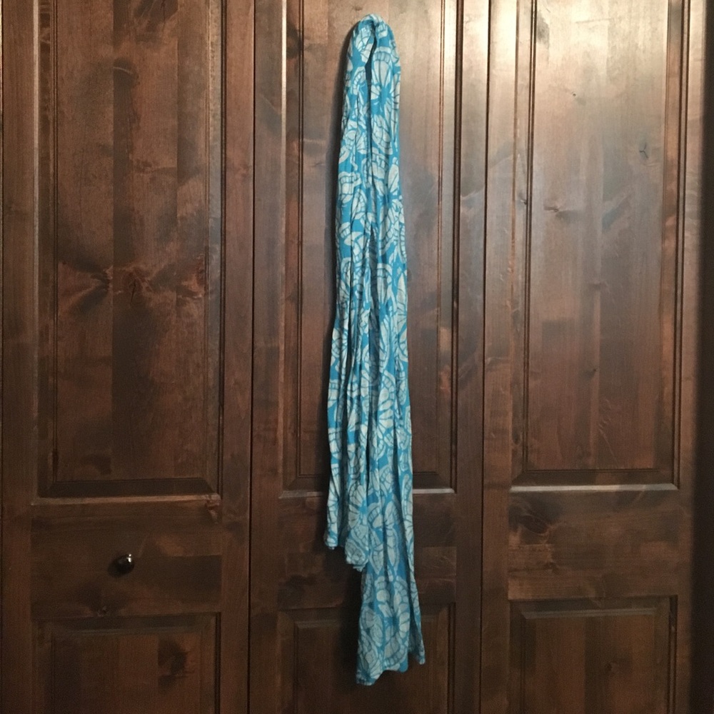 Turquoise and white butterfly patterned scarf
