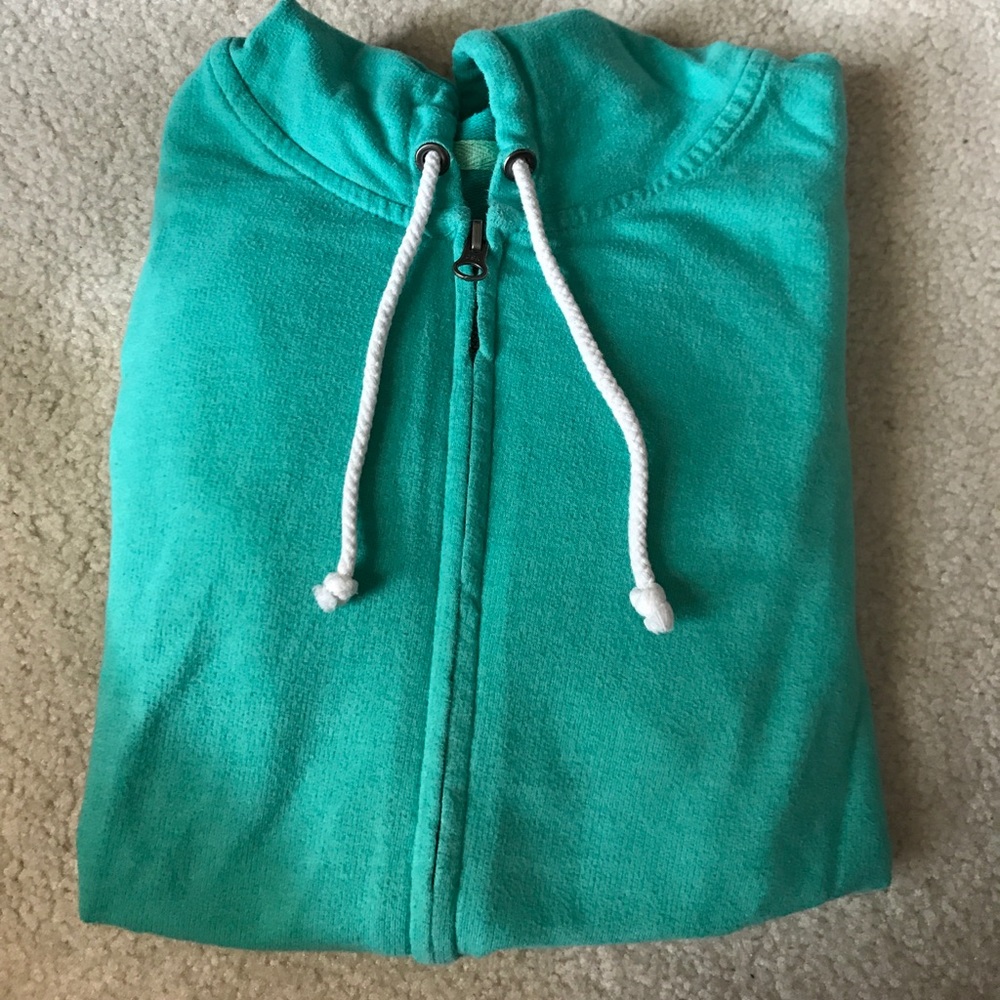 greenish-blue zip up hoodie