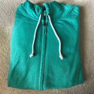 greenish-blue zip up hoodie