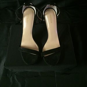 Express black sandals with heels.