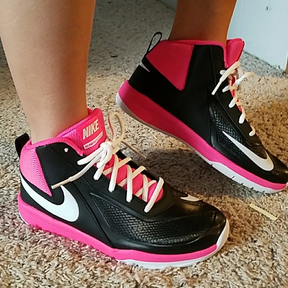 Cute high cut nike shoes.