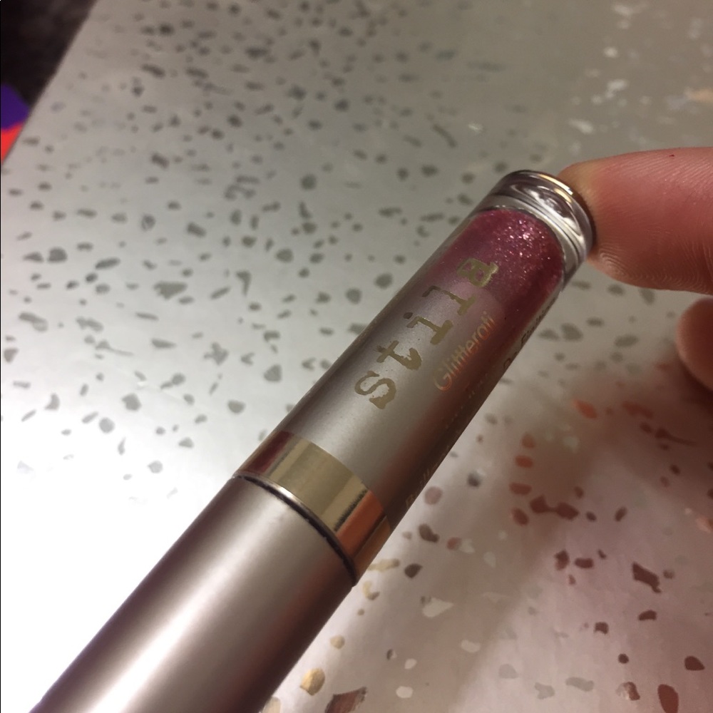 Stila lip top coat glitterati in Transcend