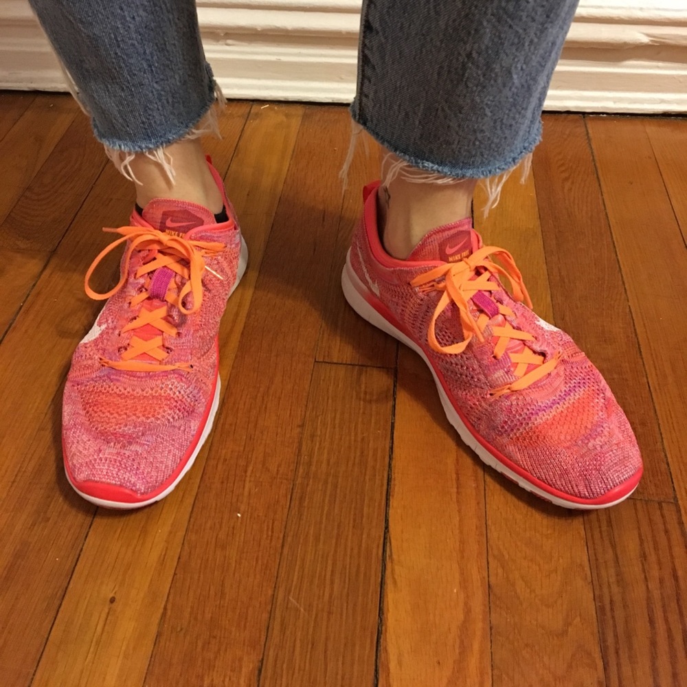 Nike Deep Coral and Orange Flyknit Running Sneaker