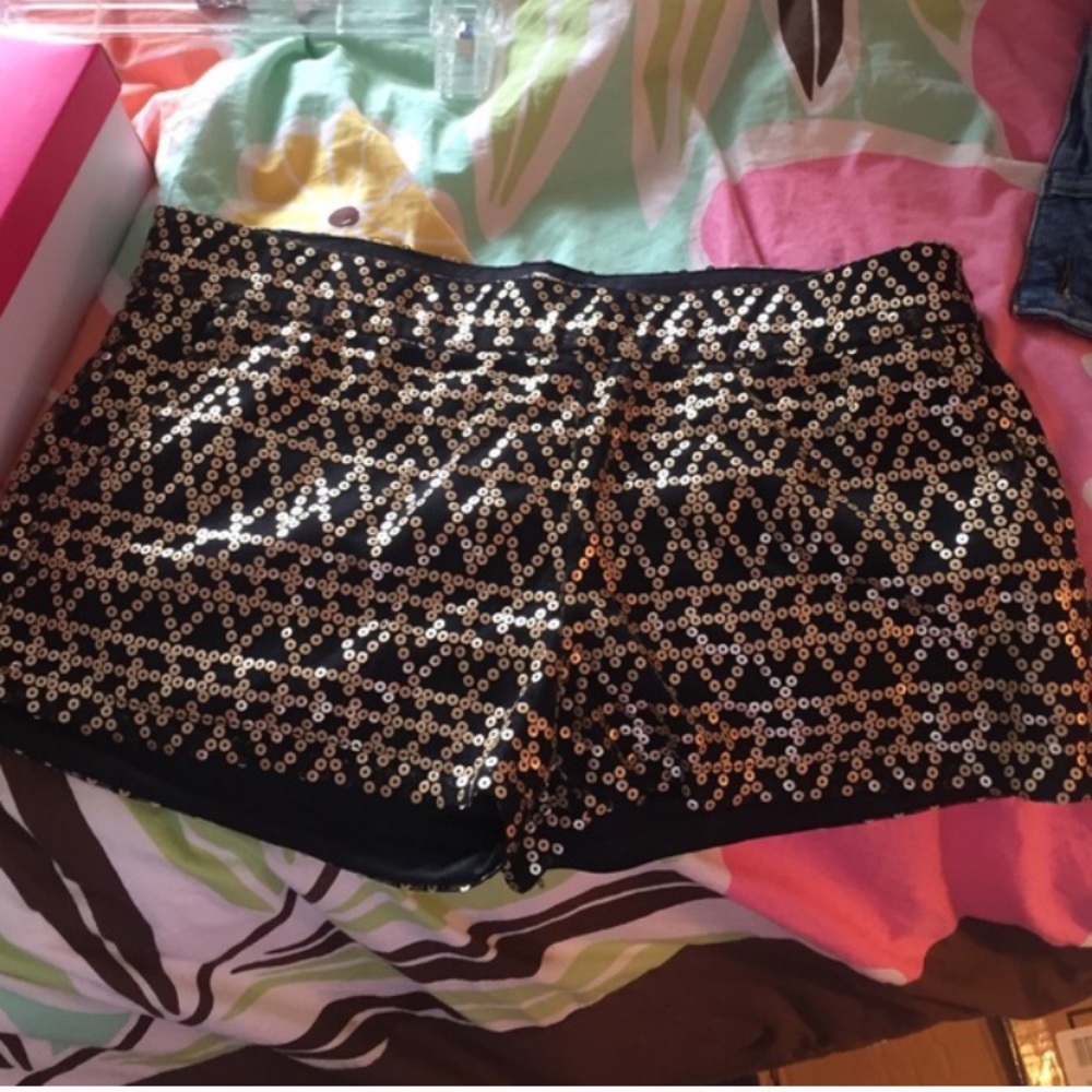 Black and gold sequin shorts never worn.