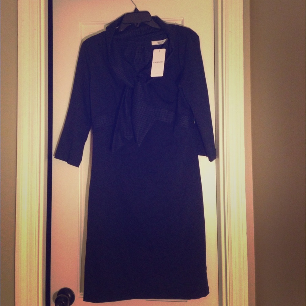 Blue dress with black checkered detail. Elegant!