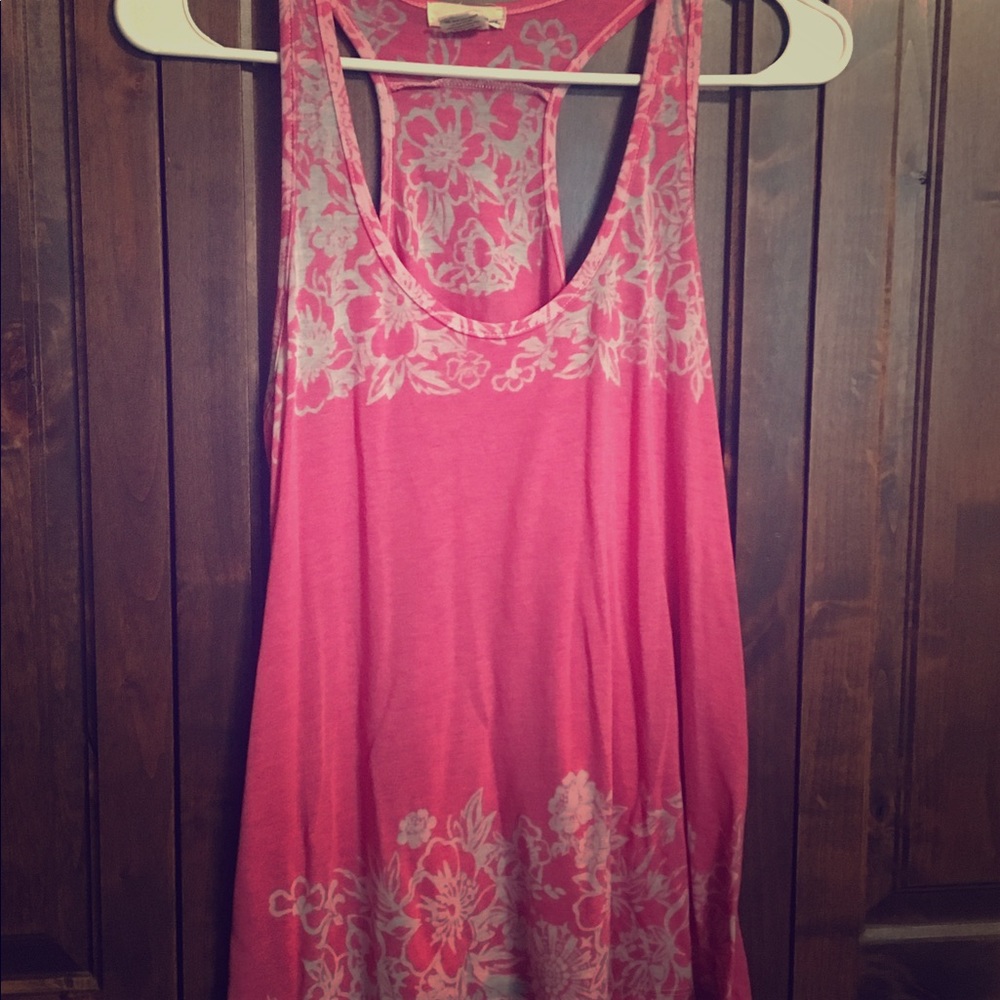 Pink racerback tank with white floral pattern