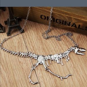 Silver dinosaur bones necklace