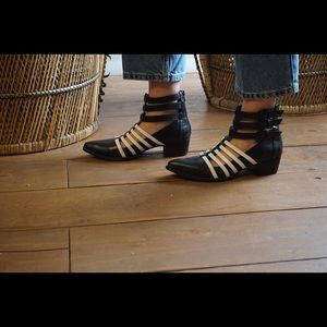 Triple buckled black and white bootie