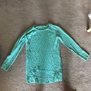 Knitted sweater in turquoise
