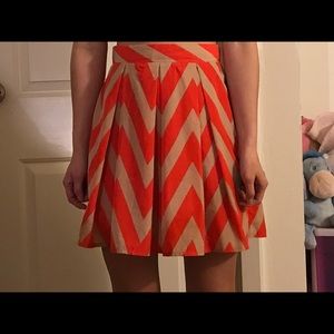 Francesca's orange patterned skirt