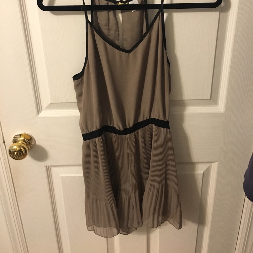 Brown romper with black detailing