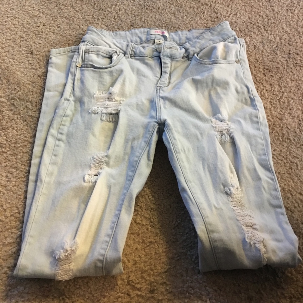 Light skinny jeans with rips
