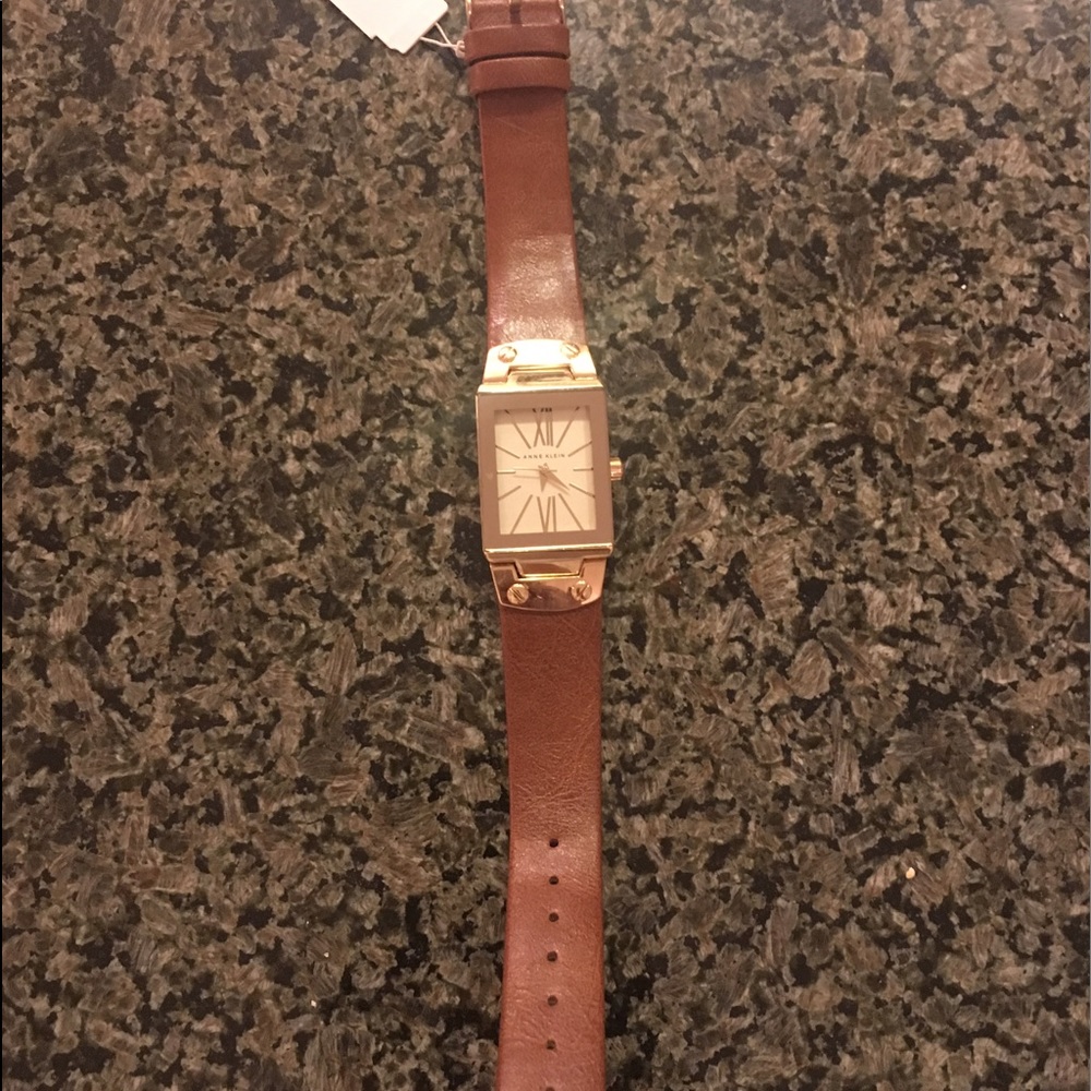 Anne Klein AK 1770 Brown Watch with Gold trim.