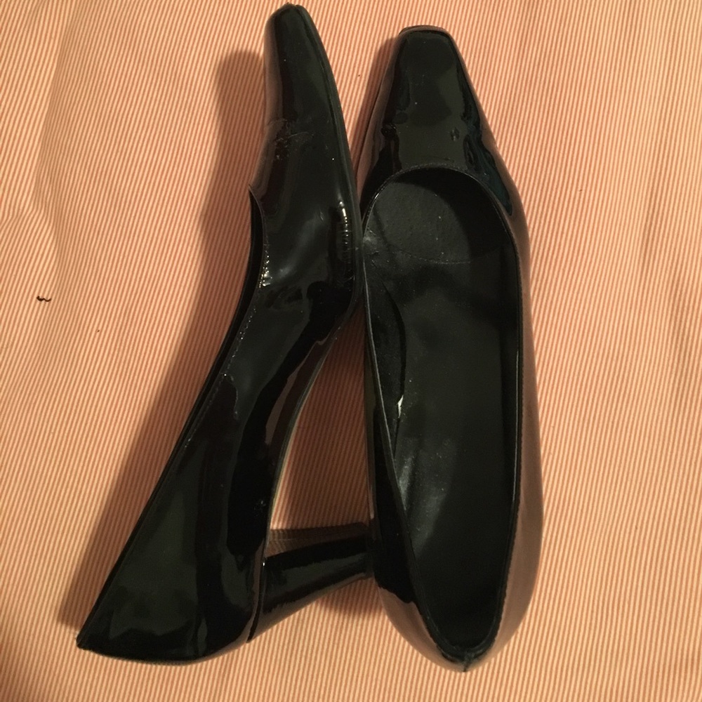 Van Eli black patent pumps
