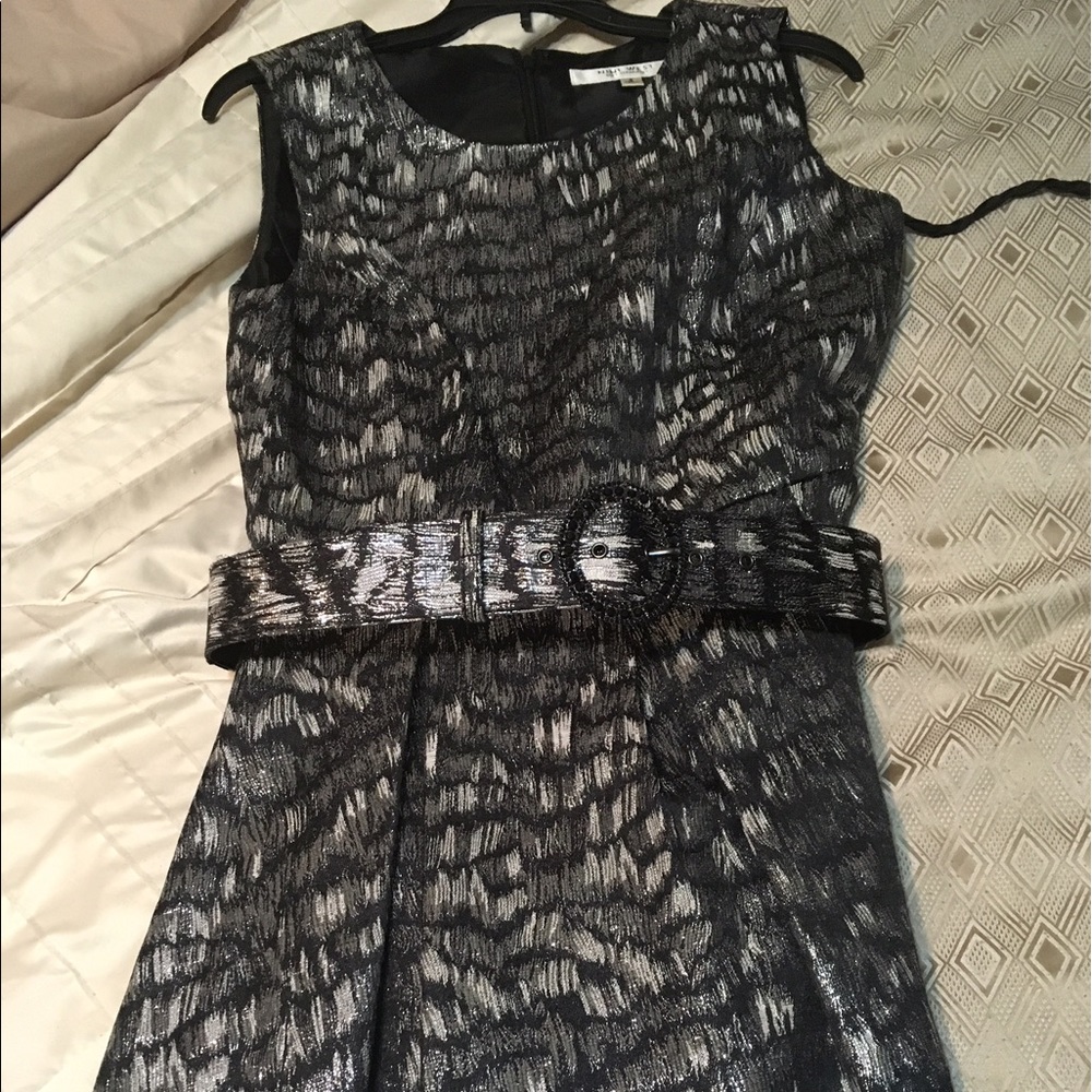Nine West flattering black dress with belt.