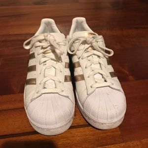 Adidas Superstar white and gold shoes