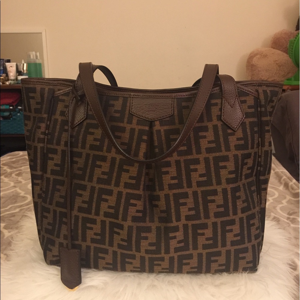 ***SOLD***Fendi likes new comes with card, dustbag