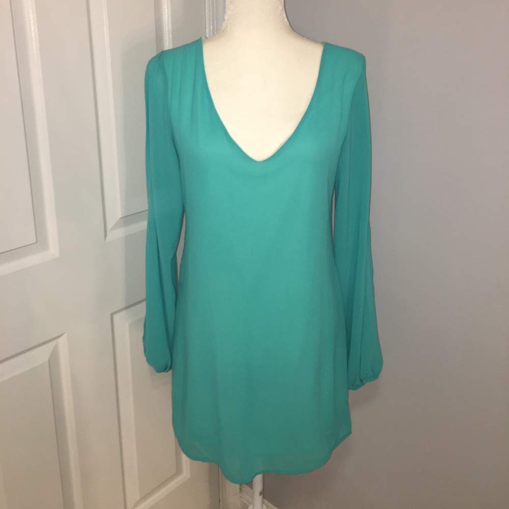 Open shoulder/arm long sleeve shift dress