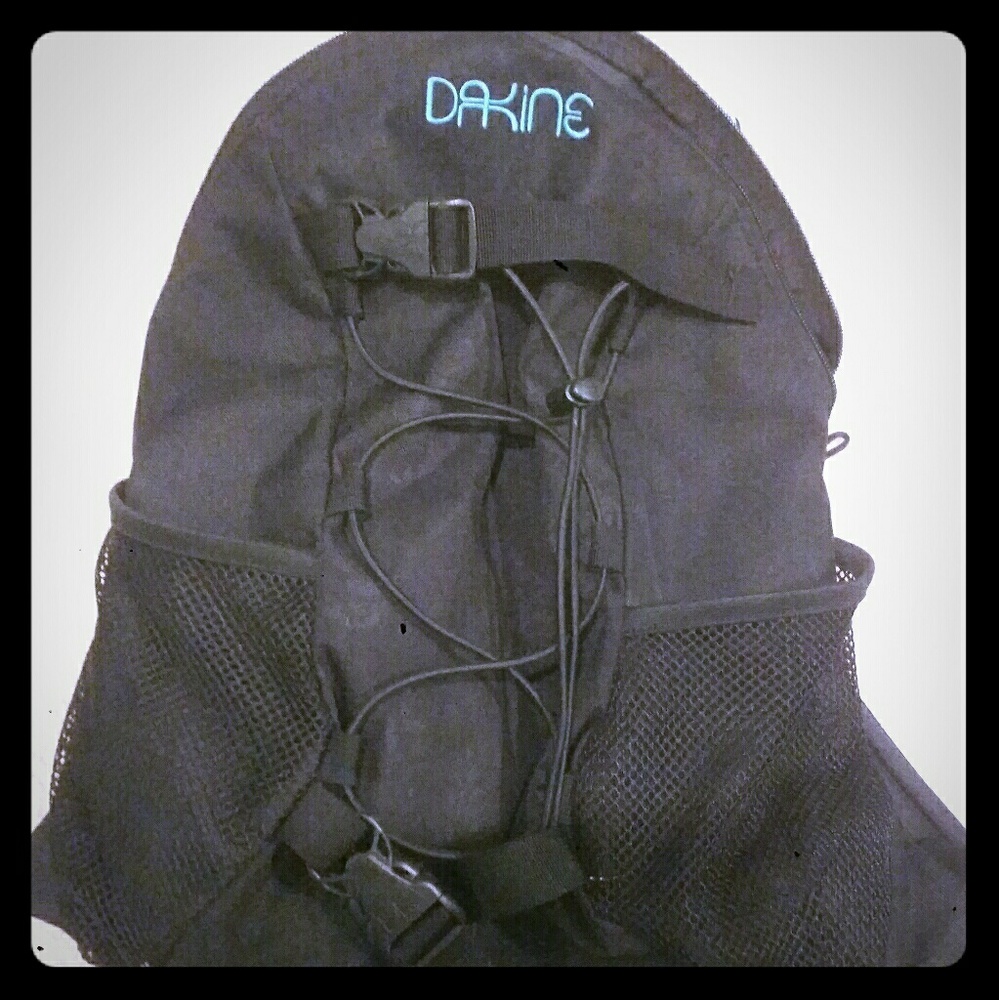 Black and turquoise Dakine Backpack