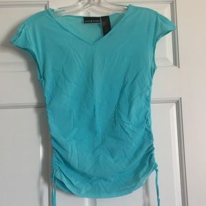 Pretty blue DKNY semi sheer top with tie sides
