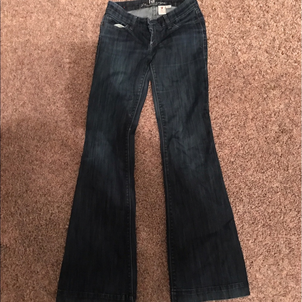 Dark, long jeans.