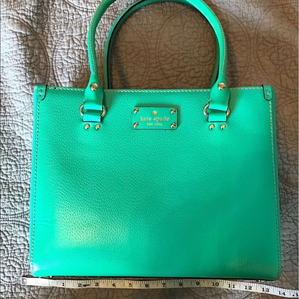 Kate Spade teal bag with polka dot lining