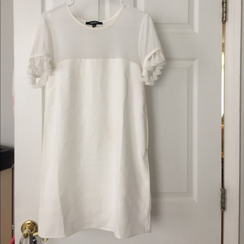 White dress with mesh chest and tassel sleeves