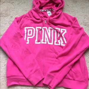 A pink zip up hoodie