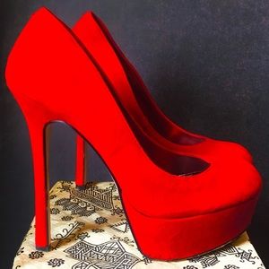 Cherry red suede pumps