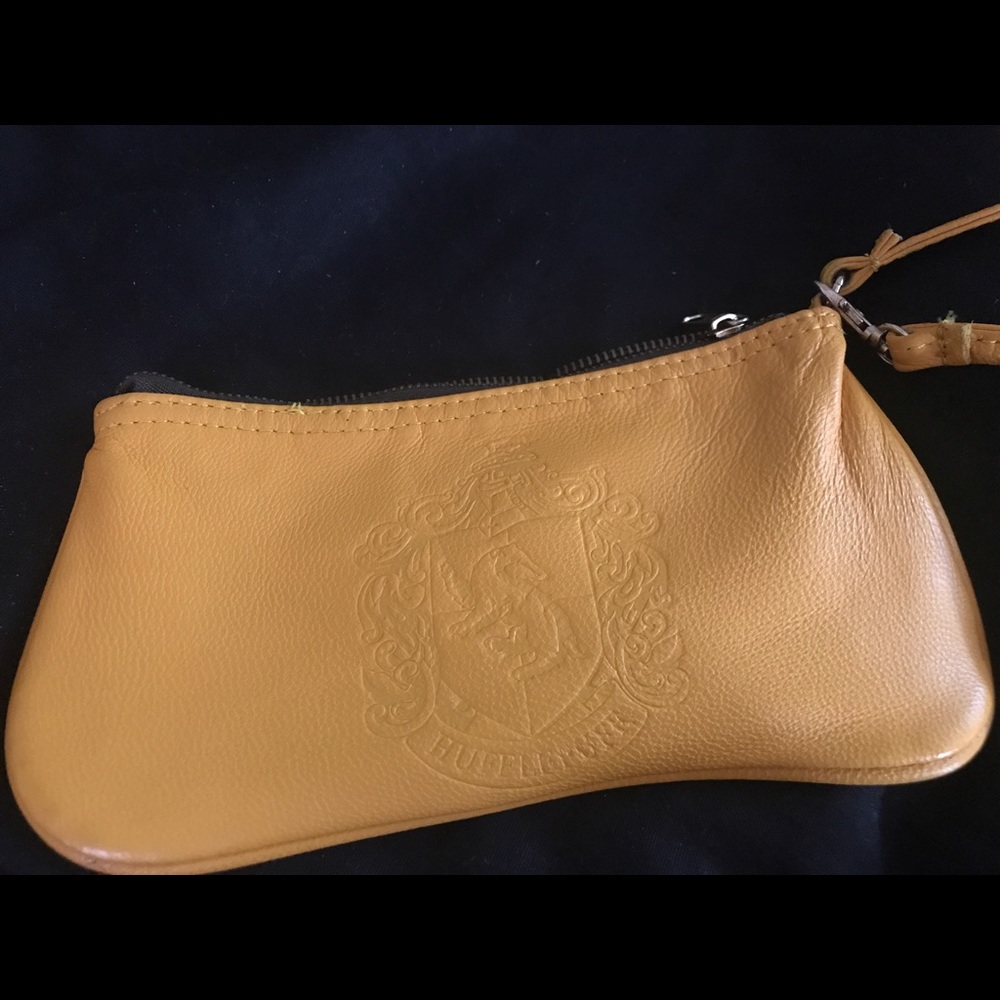 HufflePuff wristlet WizardingWorldof Harry Potter.
