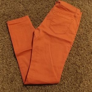 JCPenneys orange skinny pants