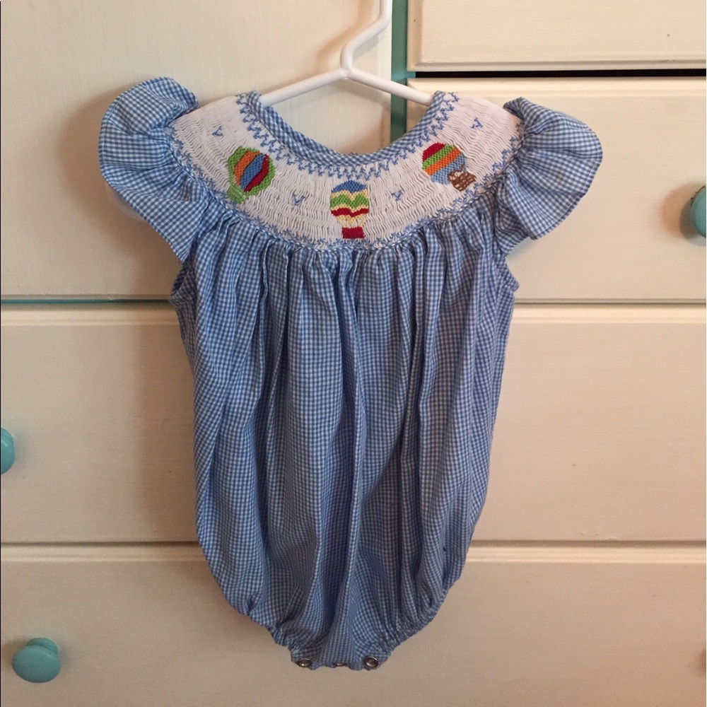 Little blue onesie with hot air balloons for girl