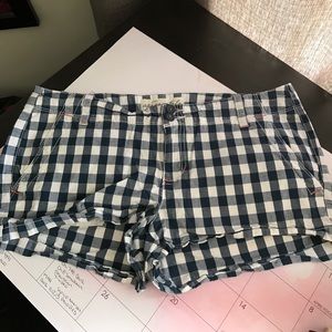 Blue and white plaid shorts