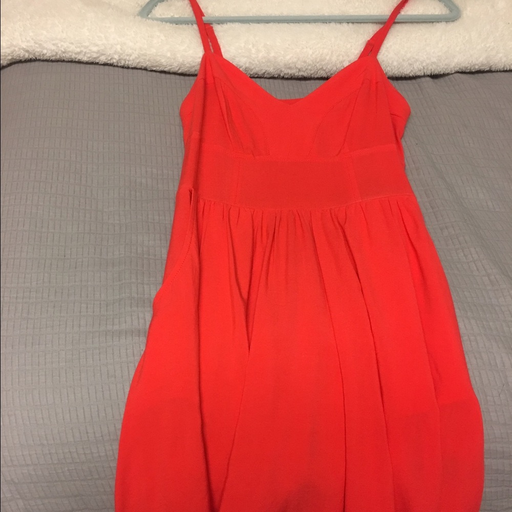 Orange dress with pockets! Fits super cute