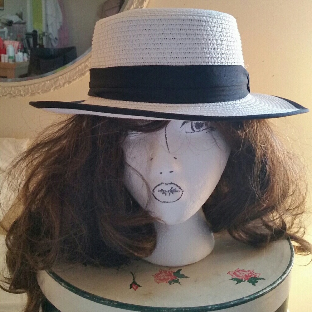 Wide brim, white straw boater hat with black trim!
