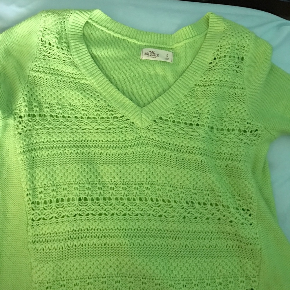 Green Vneck sweater.