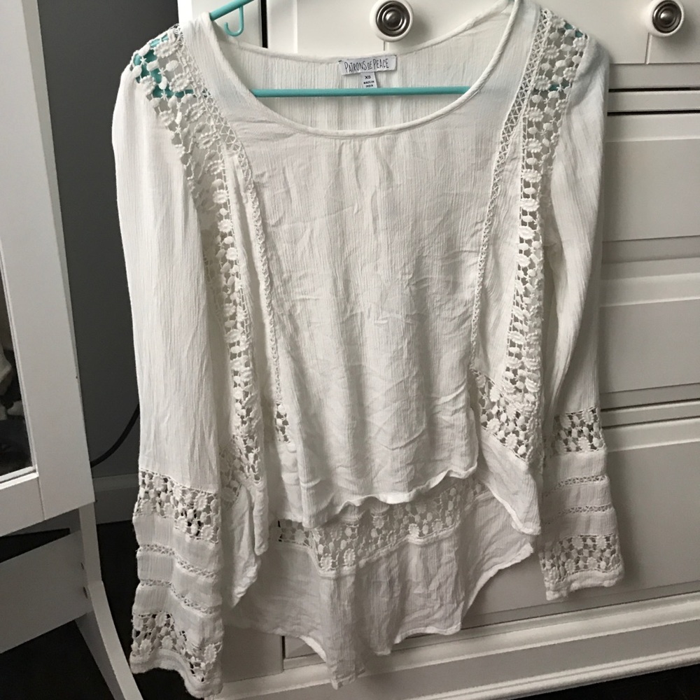 Tilly's white lace shirt