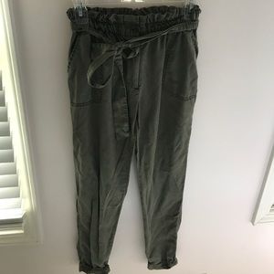 Army green jogger style pants.