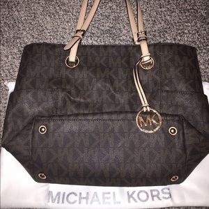 Authentic Michael Kors purse and wallet with bag