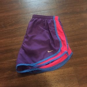 Purple and pink Nike shorts