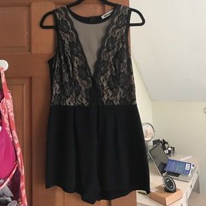 Cream and black romper