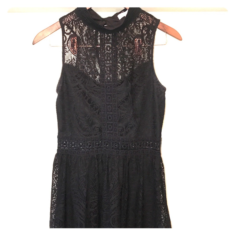 Sleeveless black lace dress