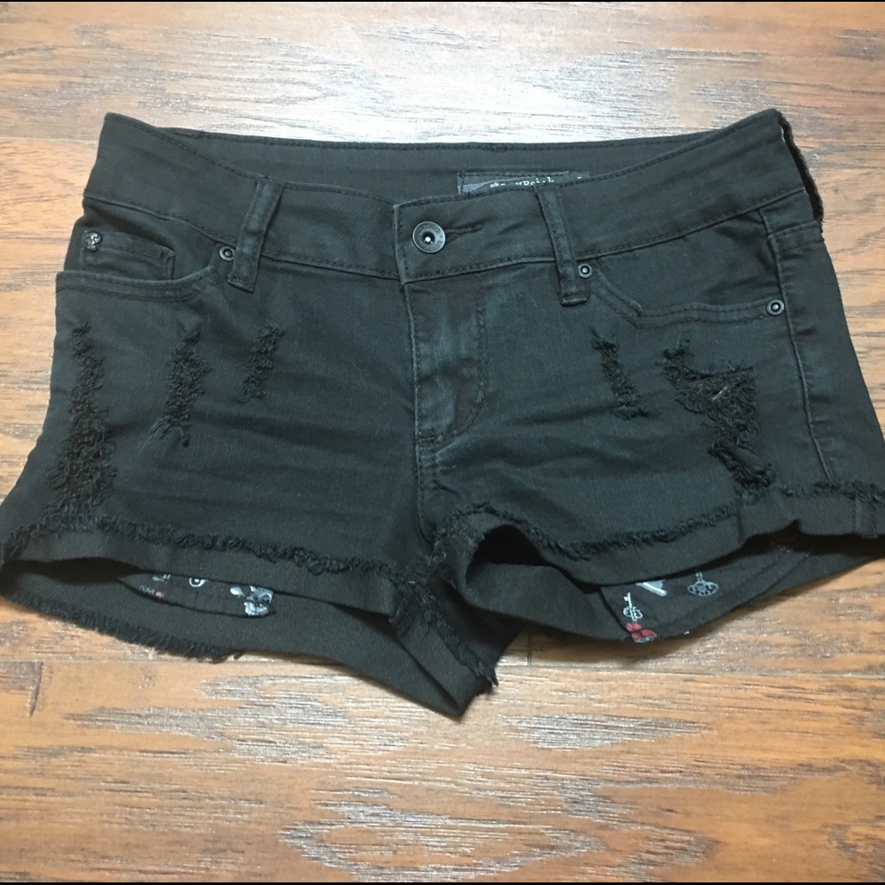 Black distressed shorts